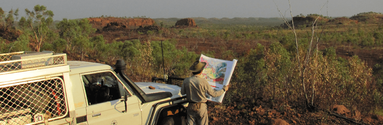 Man with map at mine